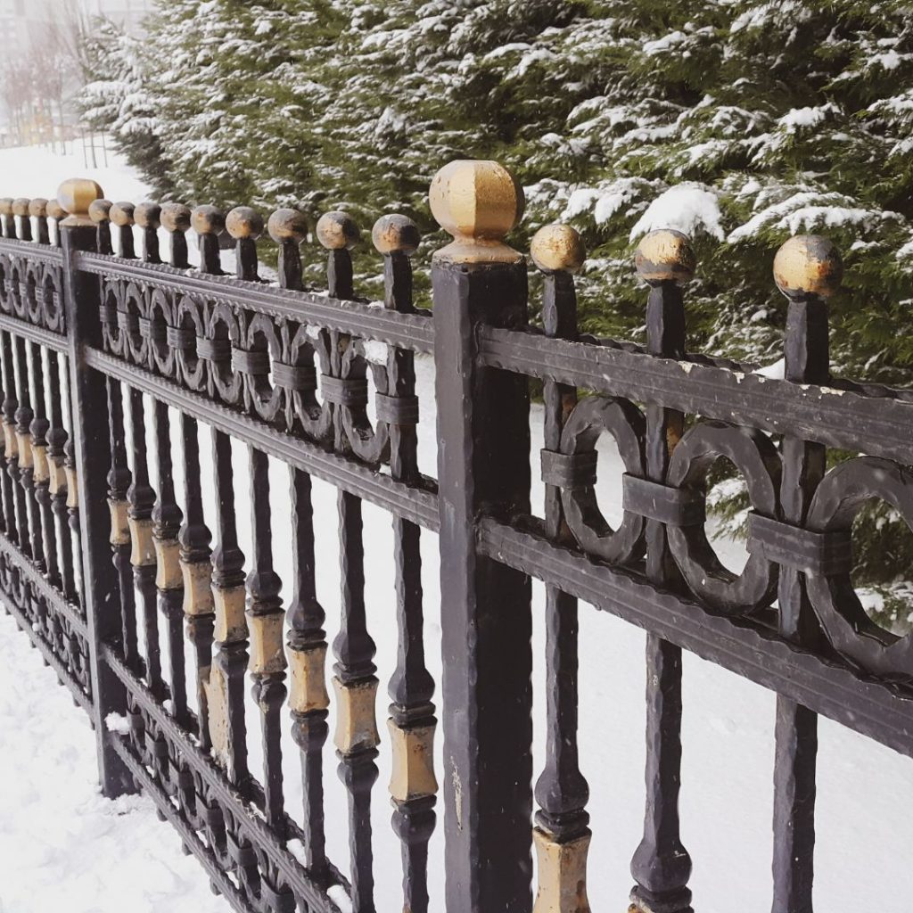 what-are-the-main-advantages-of-installing-an-iron-fence-on-my-property-iron-fence-in-snow