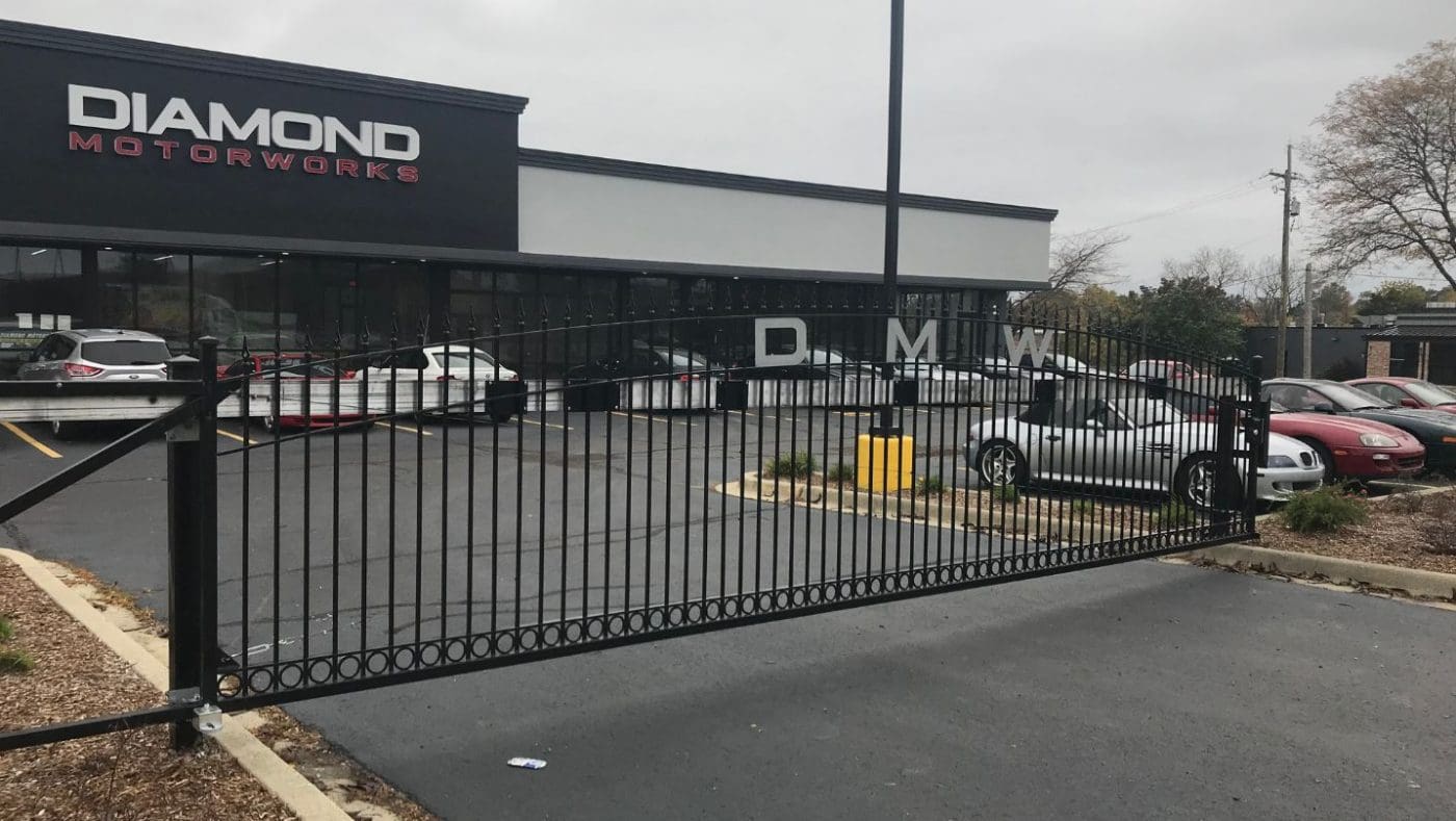 Commercial iron fence and automatic gate installation in North Park Chicago